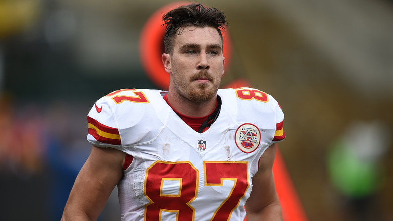 a young Travis Kelce running