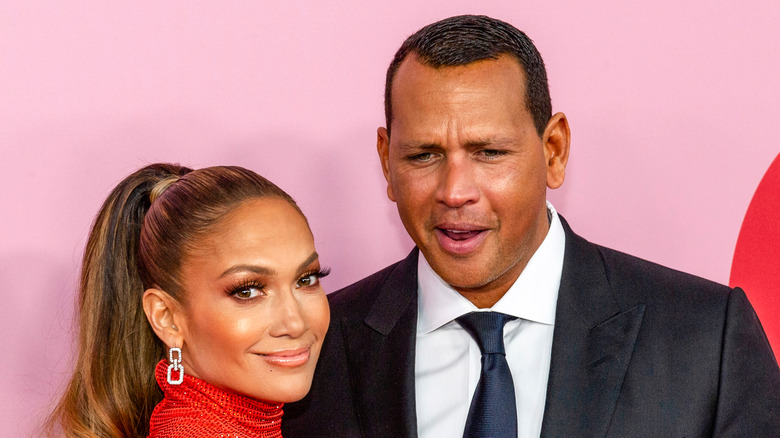 Alex Rodriguez and Jennifer Lopez at an event.