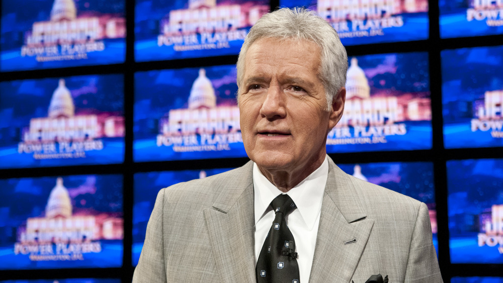 Alex Trebek wears suit on Jeopardy! set