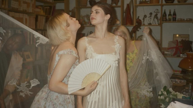 Alexandra Daddario posing in a polaroid shot of Danielle Frankel dress