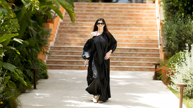 Alexandra Daddario walking in Di Pula, Italy