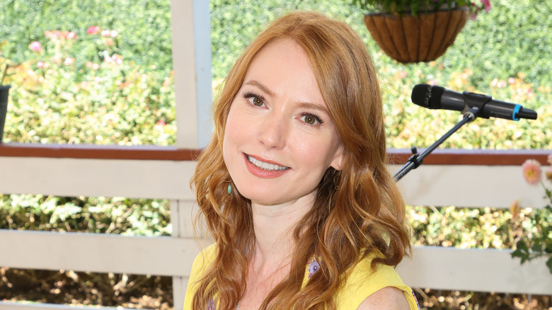 Alicia Witt poses for a photo. 