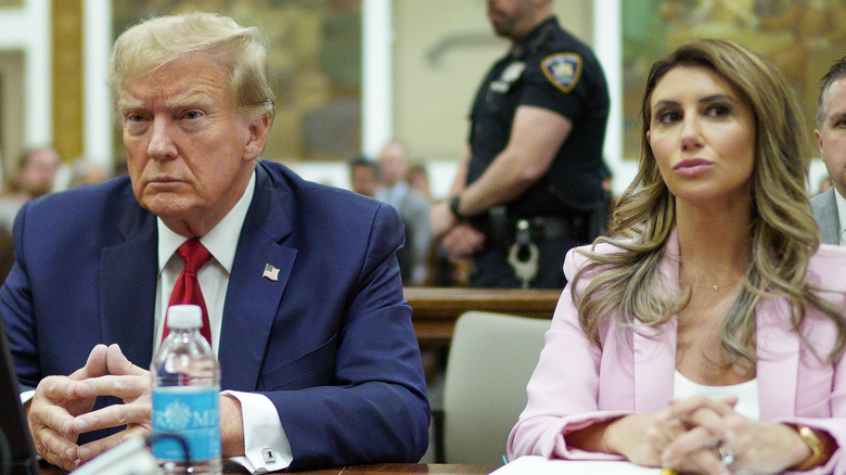 Donald Trump and Alina Habba sit side by side in courtroom