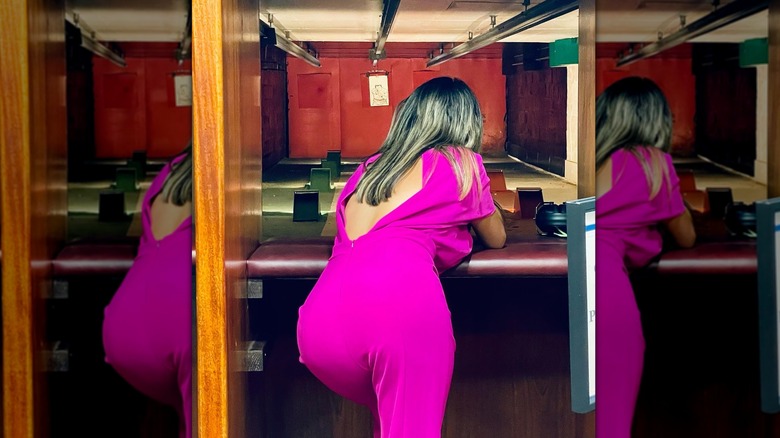 Alina Habba in pink jumpsuit in shooting range