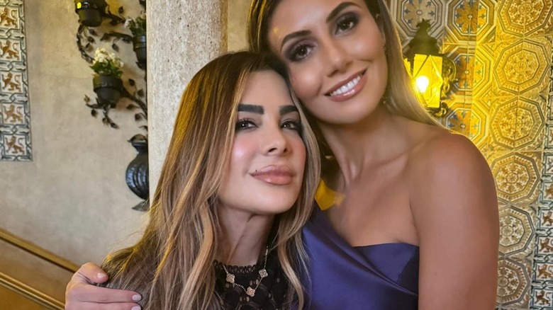 Siggy Flicker and Alina Habba smile side by side