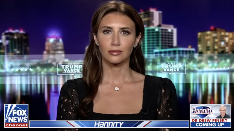 Alina Habba on Fox News, wearing her hair partially pulled back.