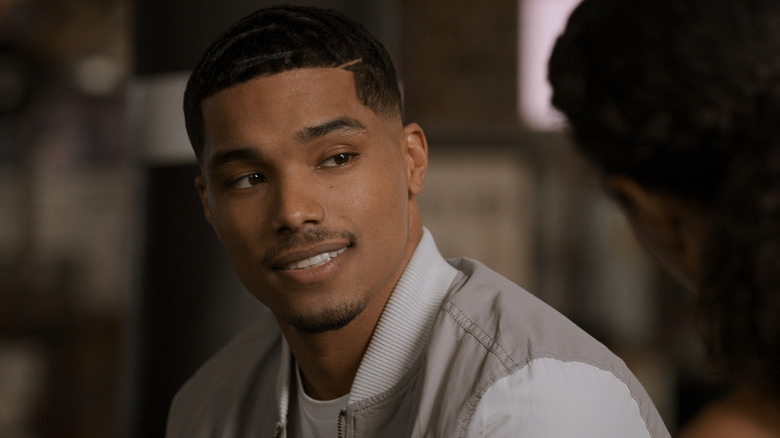 Rome Flynn smiling in Raising Dion