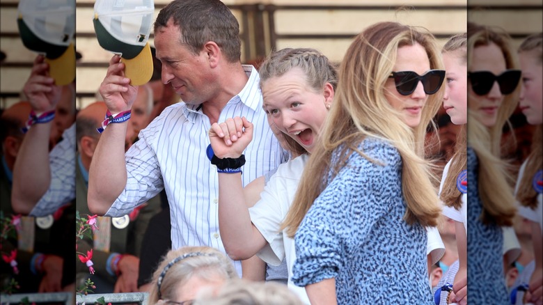 Peter Phillips and Harriet Sperling with his daughter 