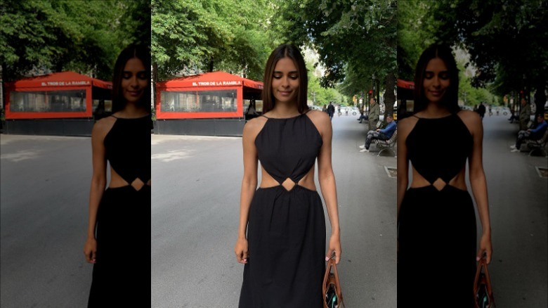 Woman in black cutout dress