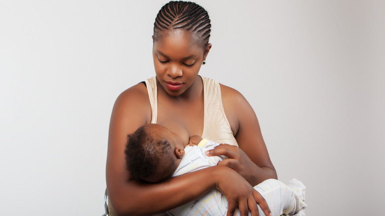 mother breastfeeding infant