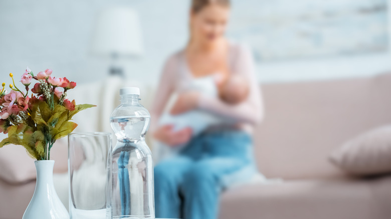 glass of water woman breastfeeding