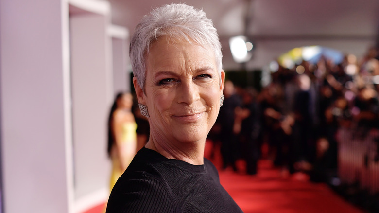 Jamie Lee Curtis smiles at an event