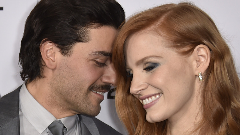 Jessica Chastain and Oscar Isaac at a premiere in 2014