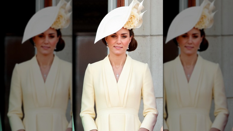 Photo of Princess Catherine wearing pale yellow dress and hat