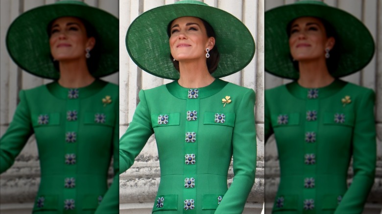 Princess Catherine on balcony wearing green hat and dress 