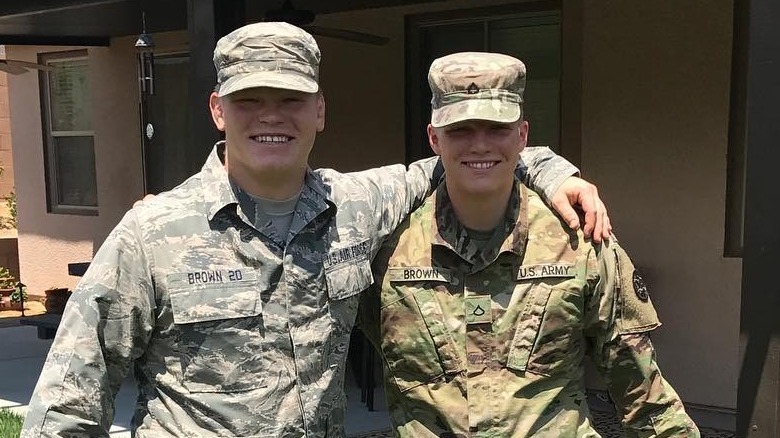 Hunter and Garrison Brown in military uniforms 