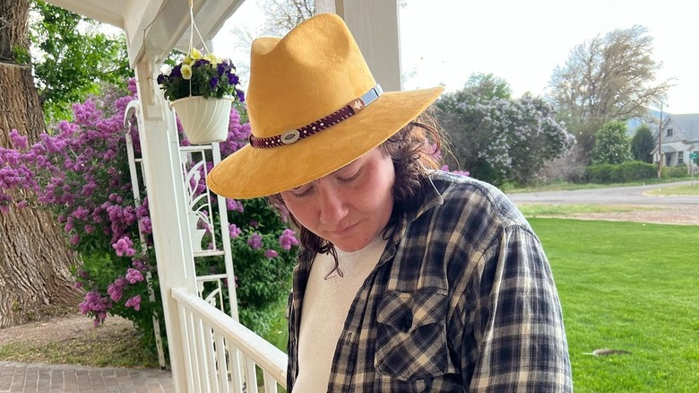 Leon Brown poses on porch