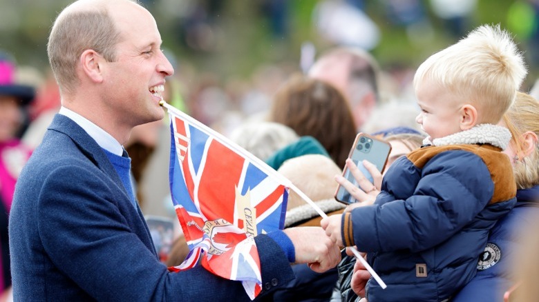 Prince William greets boy