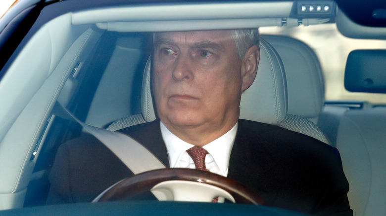 Prince Andrew in car diver's seat