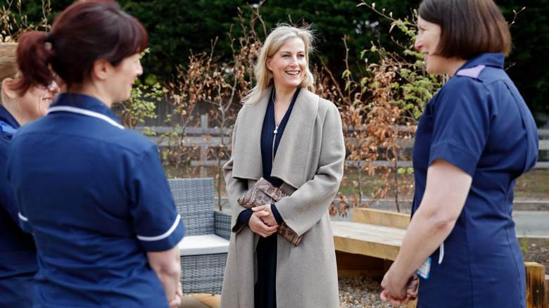 Duchess of Edinburgh speaks with hospital staff