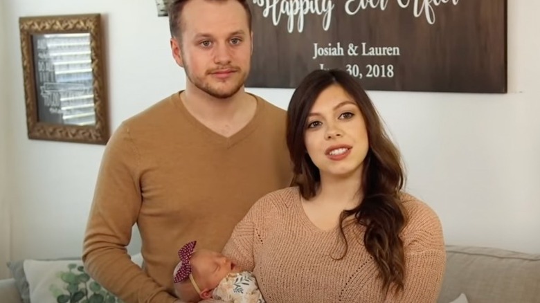 Josiah and Lauren Duggar with baby