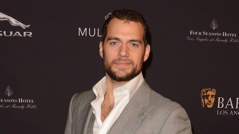 Henry Cavill smiling on the red carpet