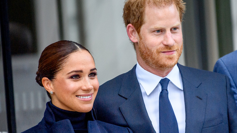 Prince Harry and Meghan Markle smiling