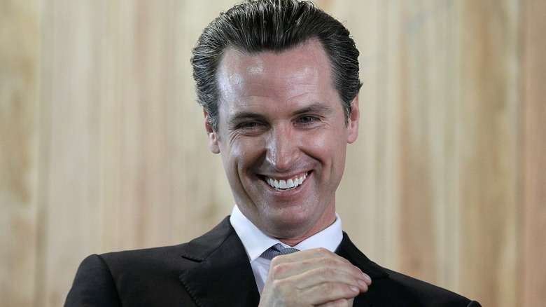 Gavin Newsom laughing during a press conference