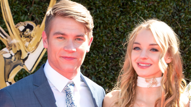 Lucas Adams and Olivia Rose Keegan at an event.