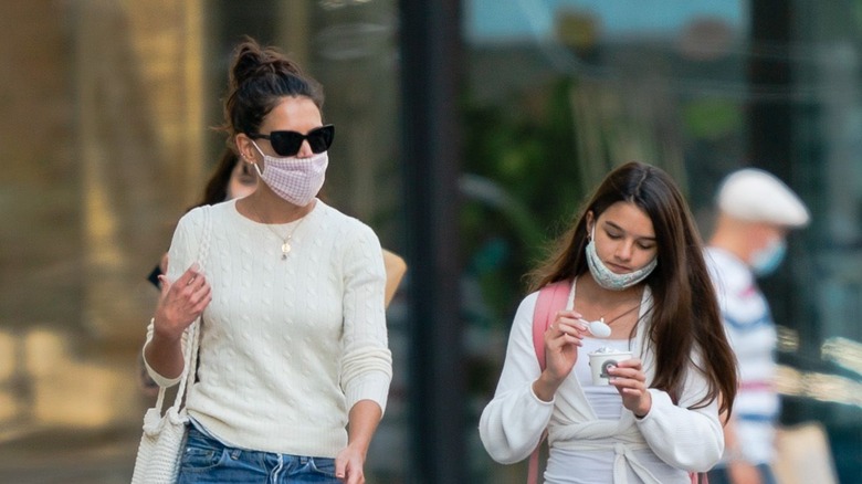 Katie Holmes and Suri Cruise eating ice cream