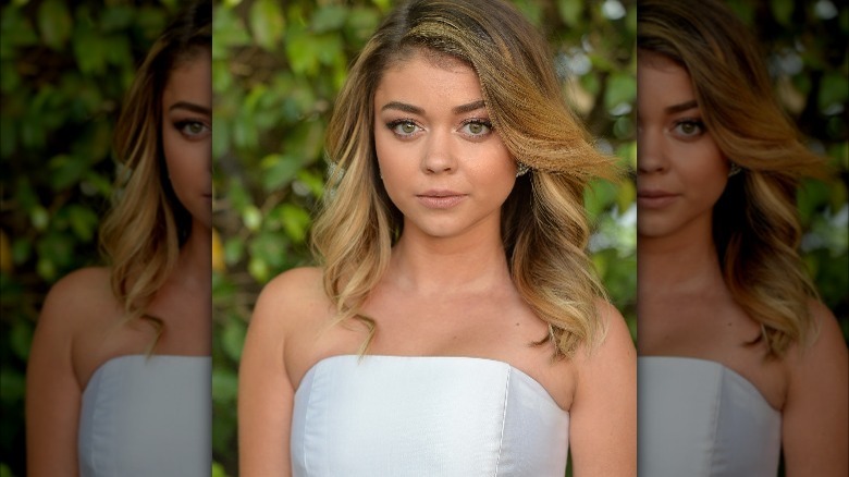 Sarah Hyland up close in white top