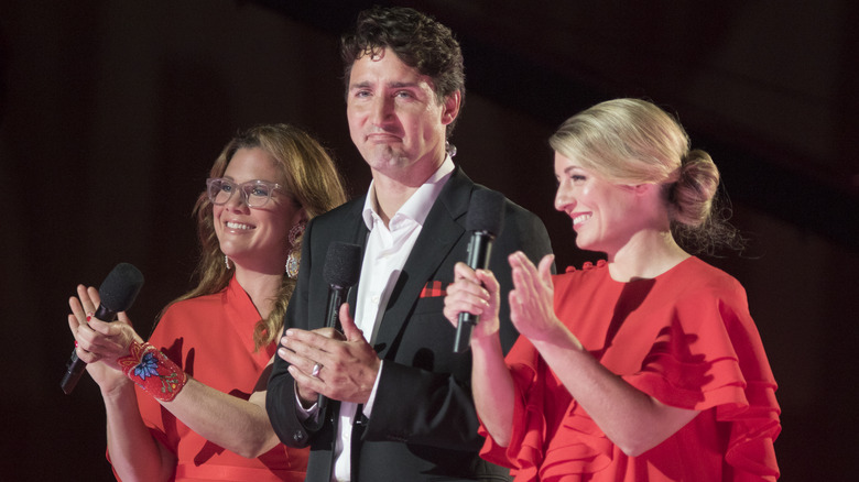 Sophie, Justin and Melanie Joly on stage