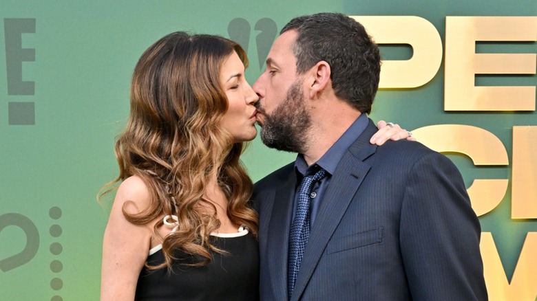 Jackie and Adam Sandler kissing at the People's Choice Awards