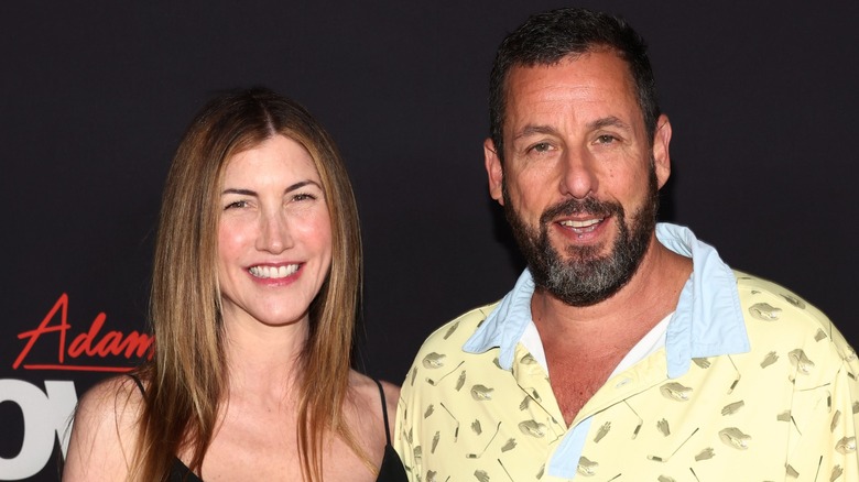 Jackie and Adam Sandler on a red carpet