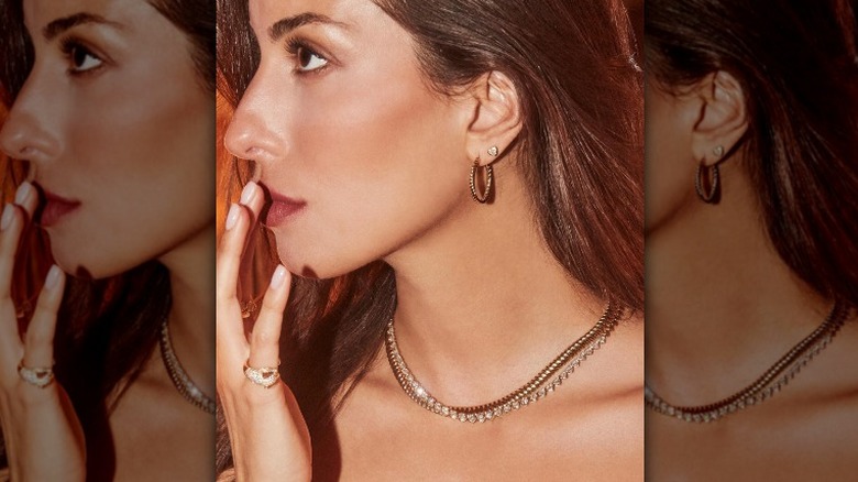 Ines de Ramon modeling Anita Ko jewelry