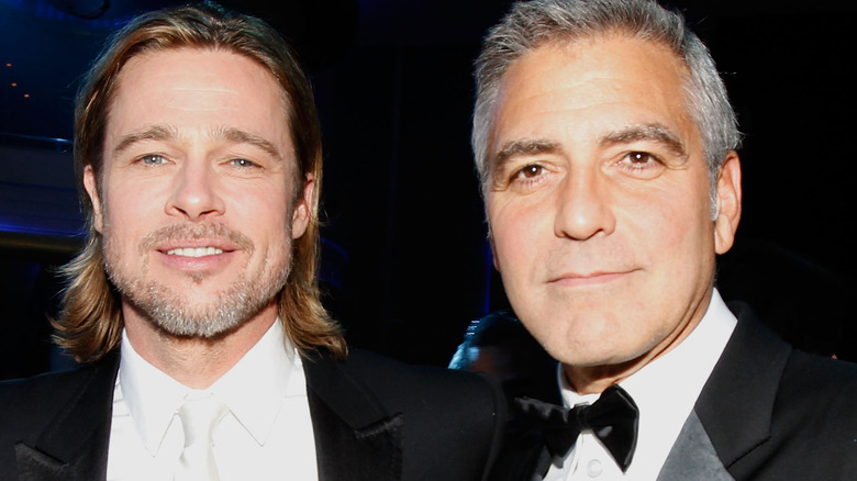 Brad Pitt and George Clooney at event