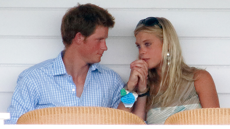 Prince Harry and Chelsy Davy holding hands