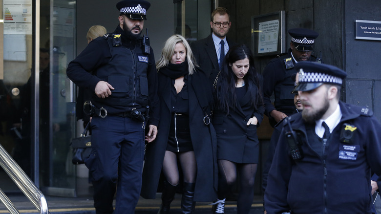 Caroline Flack leaving court with police