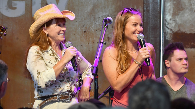 Mina Starsiak Hawk and Karen Laine laughing