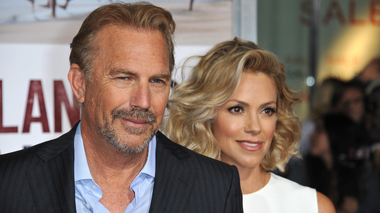 Kevin Costner and Christine Baumgartner posing