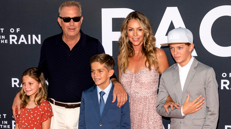 Kevin Costner, Christine Baumgartner, and their kids