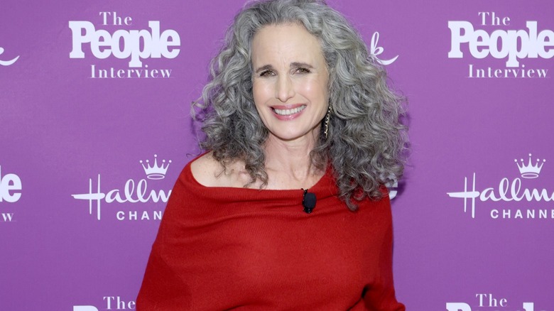 Andie MacDowell smiling on red carpet