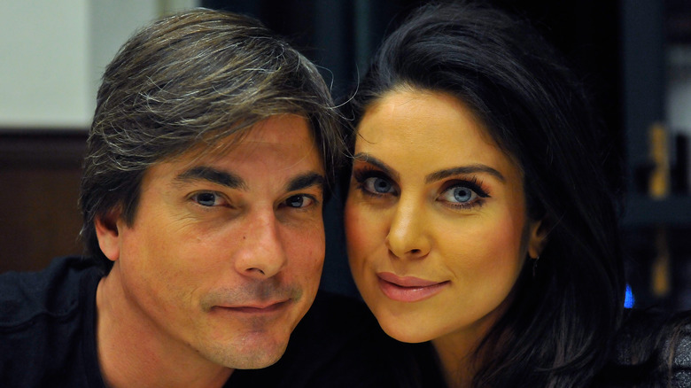 DOOL co-stars Bryan Dattilo and Nadia Bjorlin smile for the camera. 