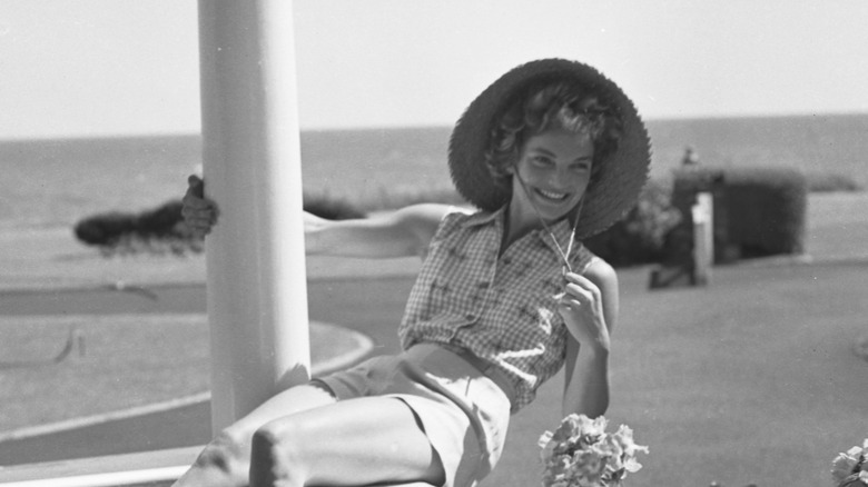 Jackie Kennedy wearing sun hat