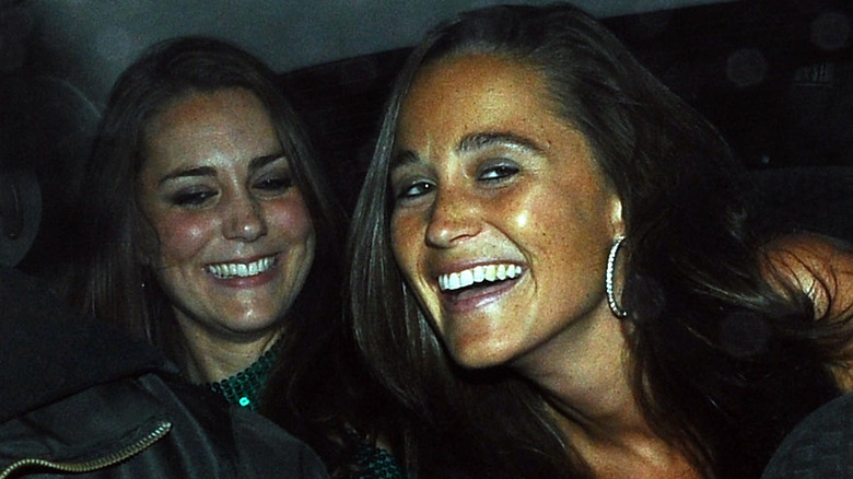 Princess Catherine and her sister Pippa Middleton laughing