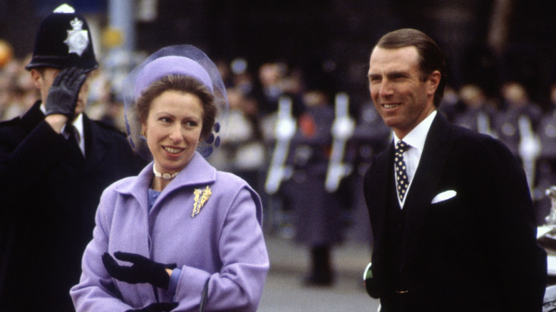 Princess Anne and Mark Phillips at event smiling 