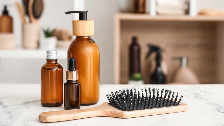 Display of hair products with brush