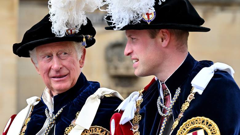 King Charles speaking with Prince William