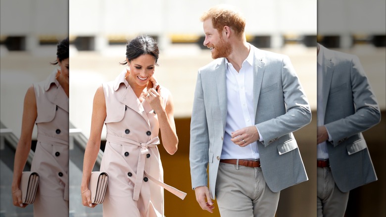 Prince Harry and Meghan Markle smiling