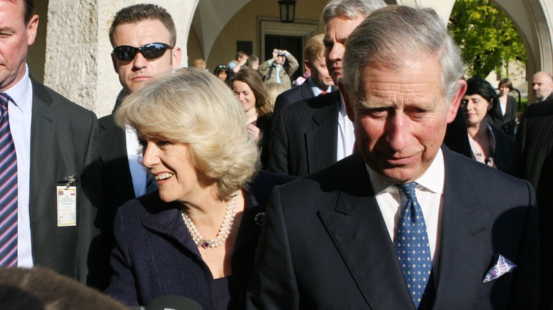 King Charles III and Queen Consort Camilla in crowd